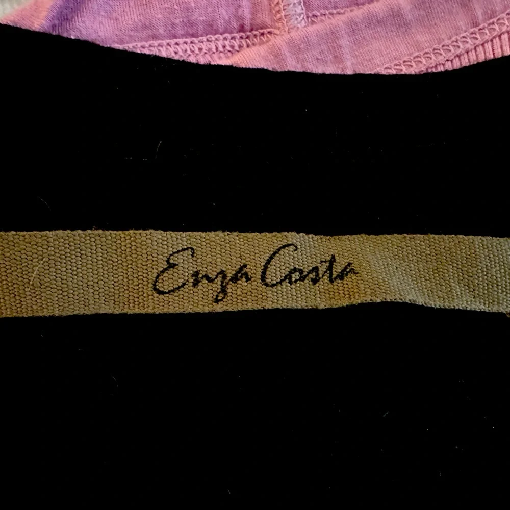 Gorgeous black peekaboo top from Enza Costa - Picture 2 of 2
